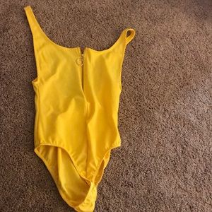 Yellow body suit